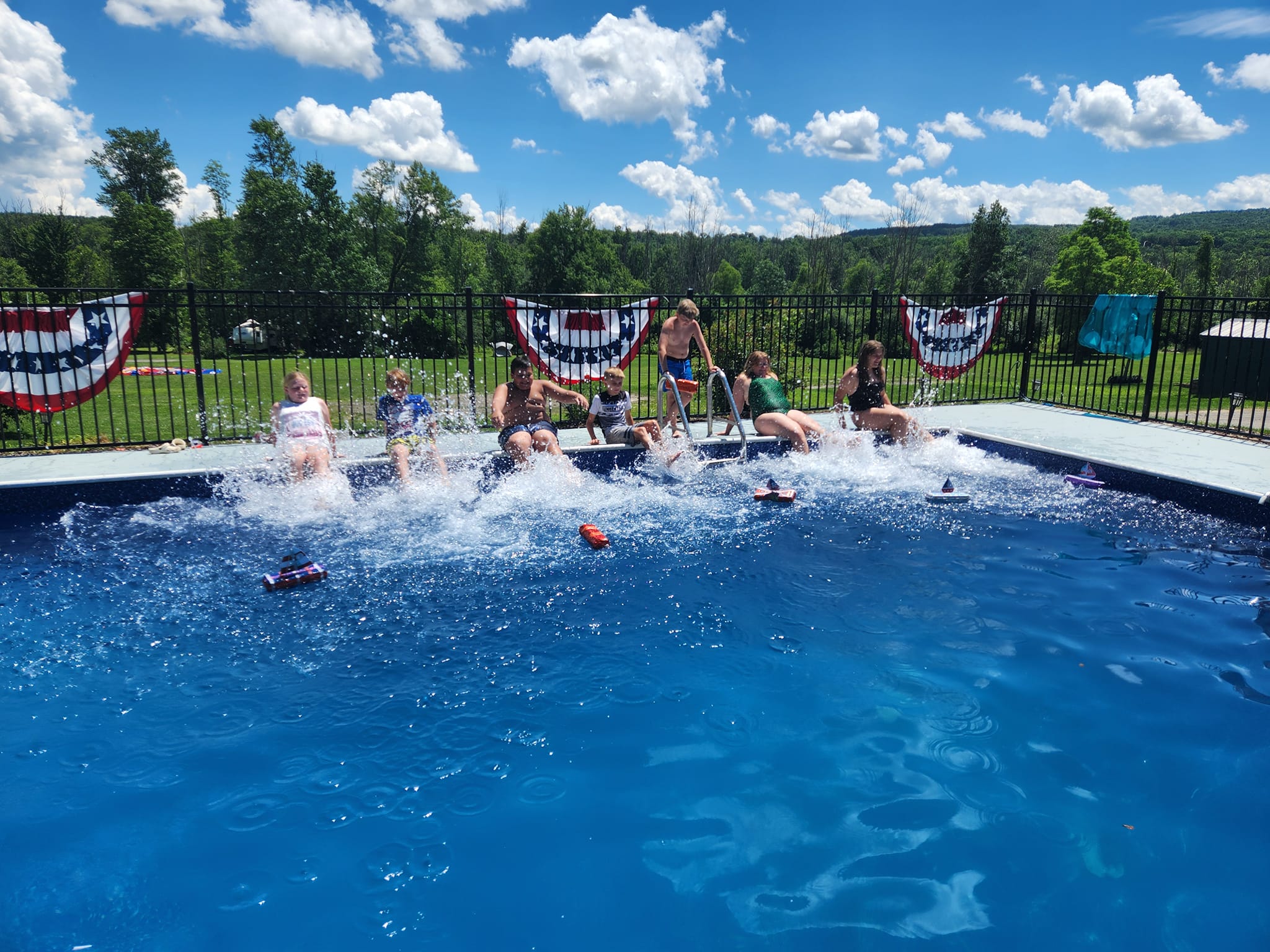 A sunny family activity at the Flint Creek pool